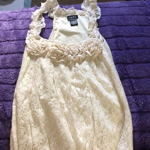 cream tank top with rose buds on the neckline